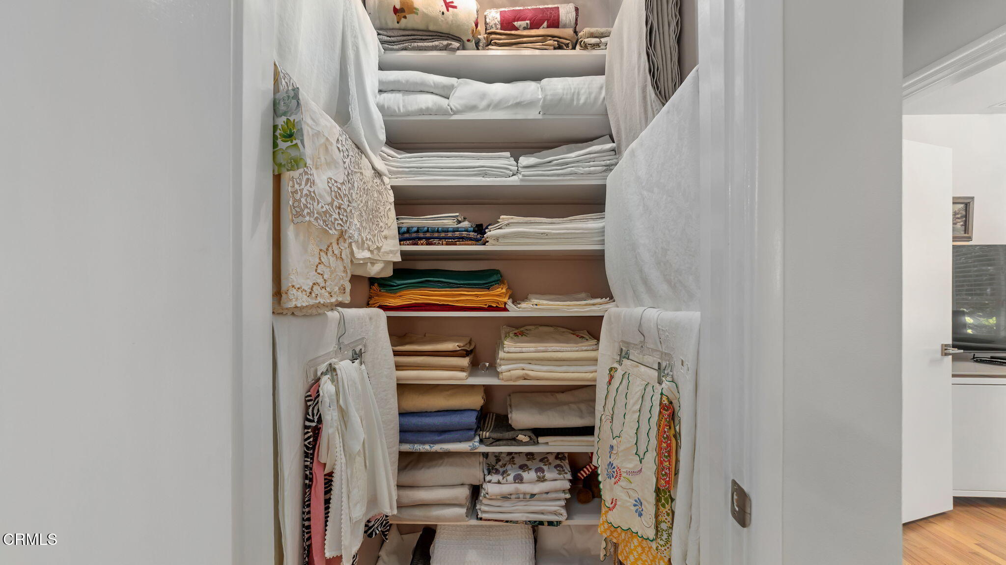 2030 North Altadena Drive Pasadena, CA 91107 - Photo 31 of 61 a view of walk in closet with clothes and shoes