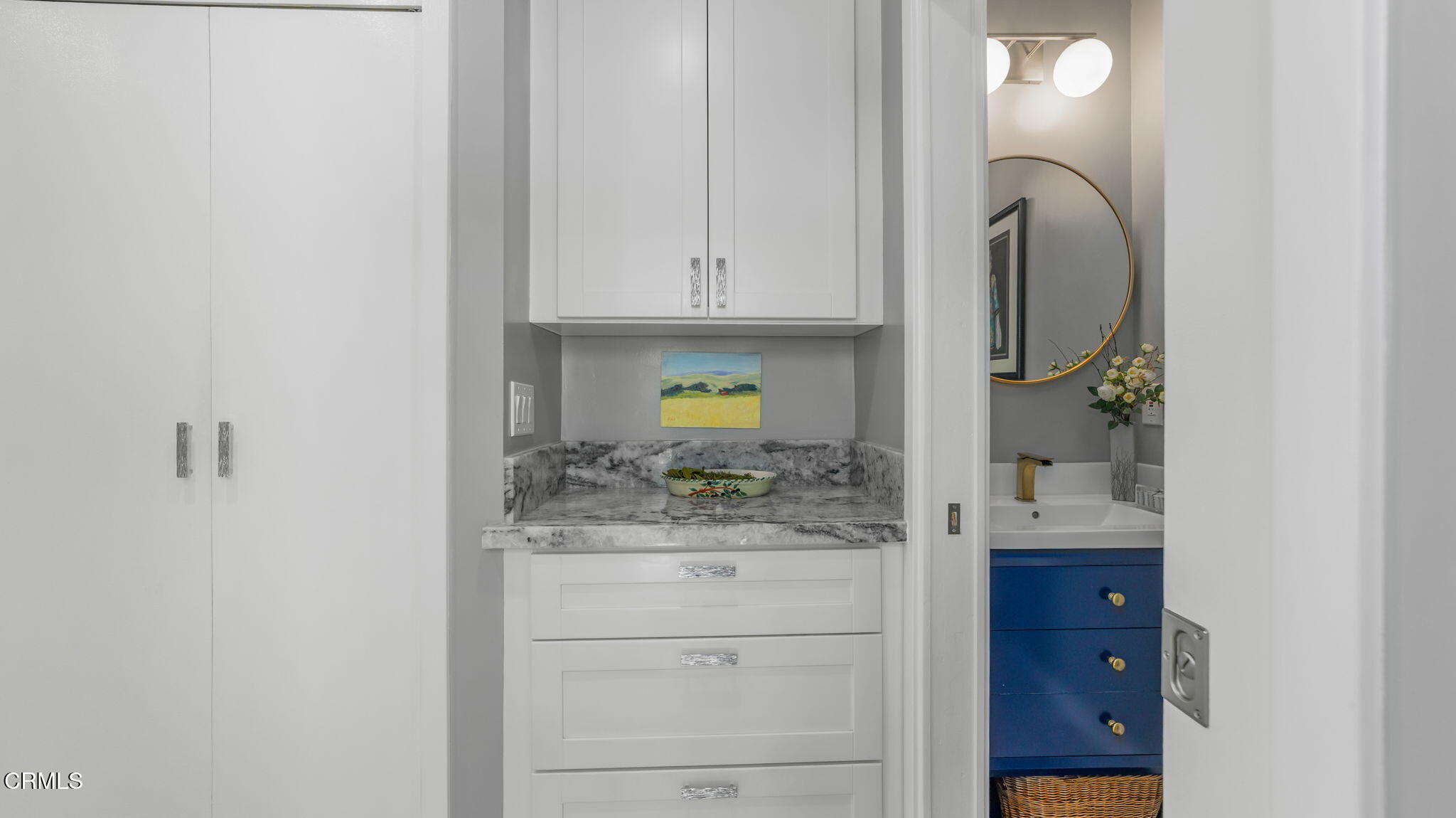 2030 North Altadena Drive Pasadena, CA 91107 - Photo 36 of 61 a bathroom with a sink and a mirror
