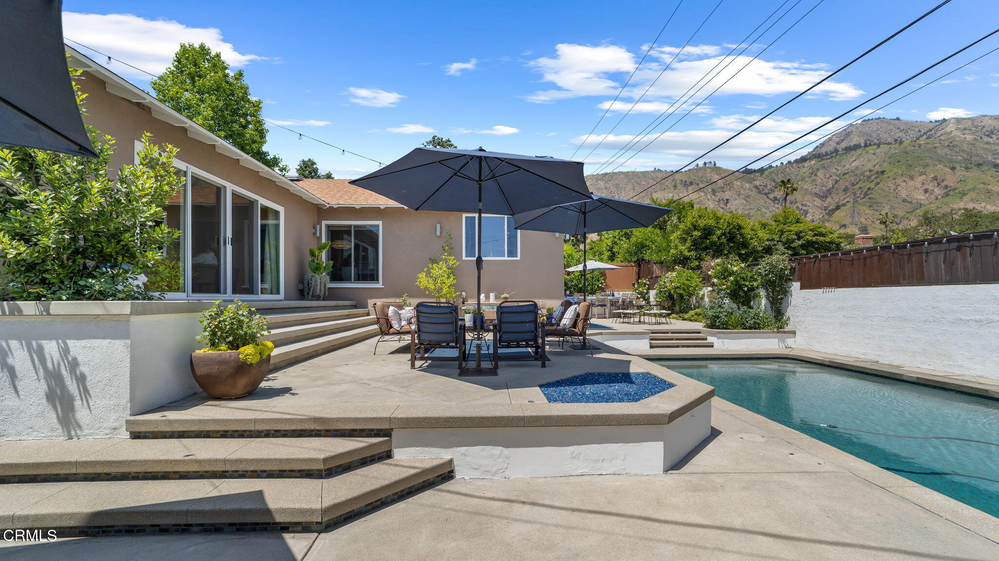 2030 North Altadena Drive Pasadena, CA 91107 - Photo 45 of 61 a view of a patio with chairs and a table