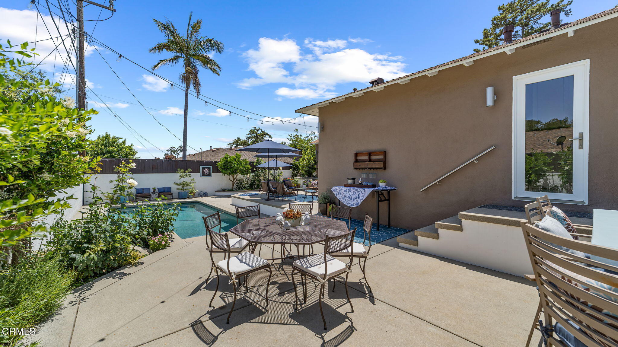 2030 North Altadena Drive Pasadena, CA 91107 - Photo 49 of 61 a view of a patio with couches table and chairs and potted plants