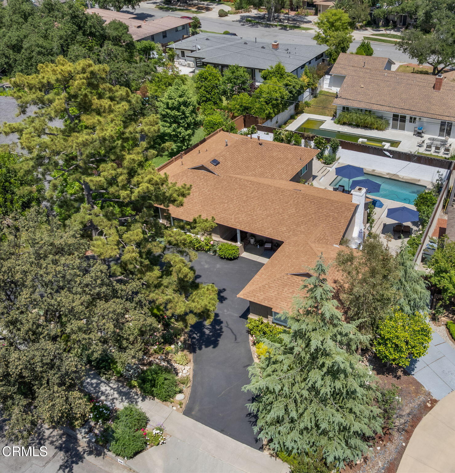 2030 North Altadena Drive Pasadena, CA 91107 - Photo 59 of 61 an aerial view of a house with a yard and trees all around
