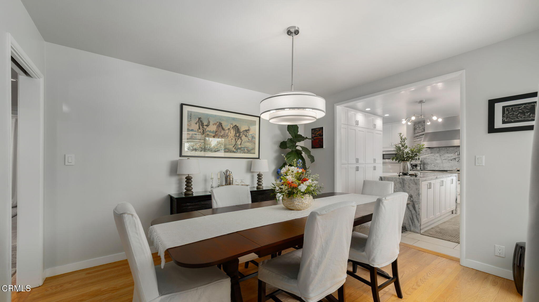 2030 North Altadena Drive Pasadena, CA 91107 - Photo 9 of 61 a view of a dining room with furniture window and wooden floor
