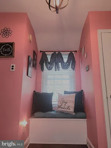 a room with furniture and a bed