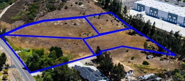 an aerial view of residential house with parking space