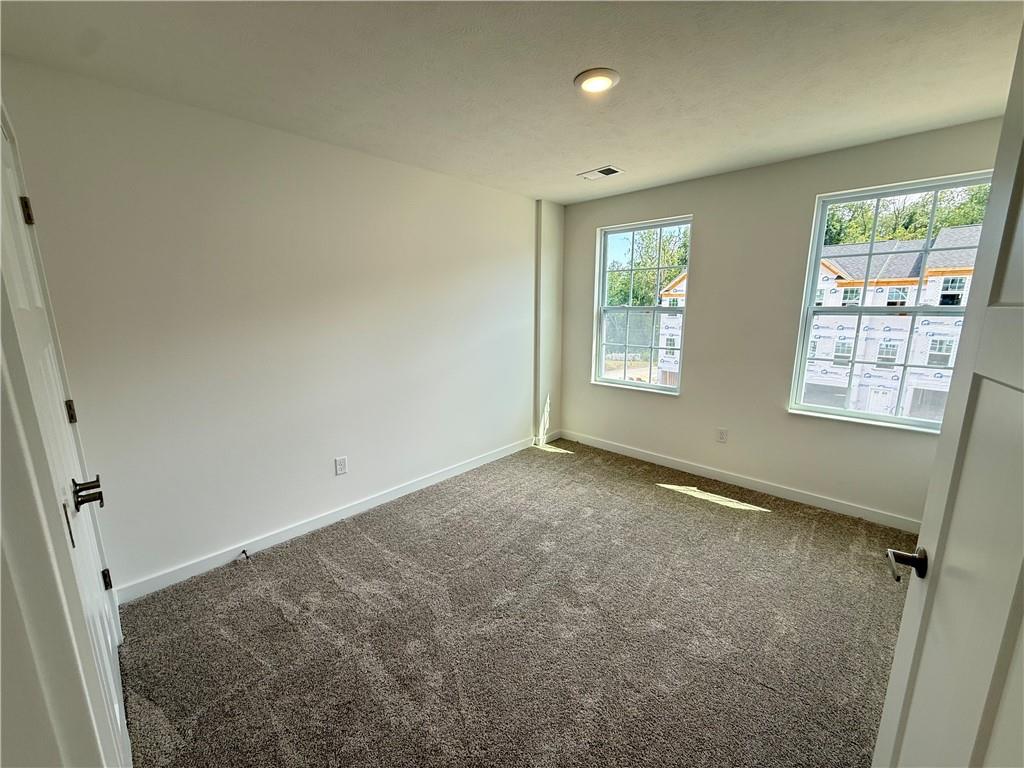 177 Lockheed Drive Coraopolis, PA 15108 - Photo 17 of 18 a view of an empty room with a window