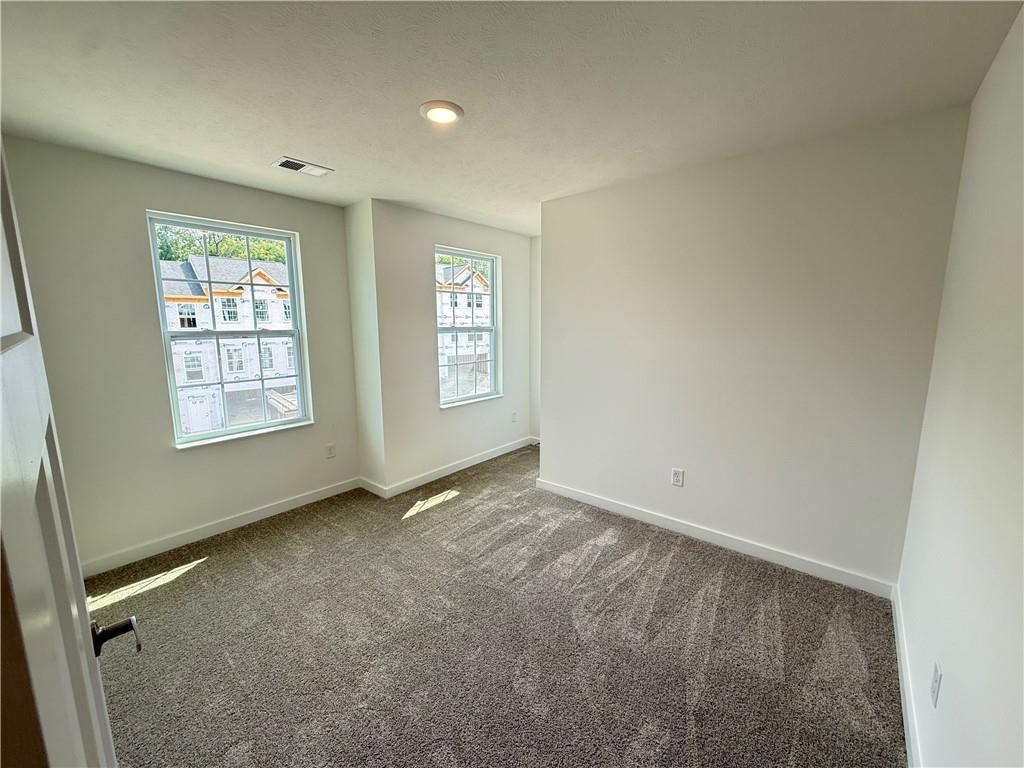 177 Lockheed Drive Coraopolis, PA 15108 - Photo 18 of 18 an empty room with windows