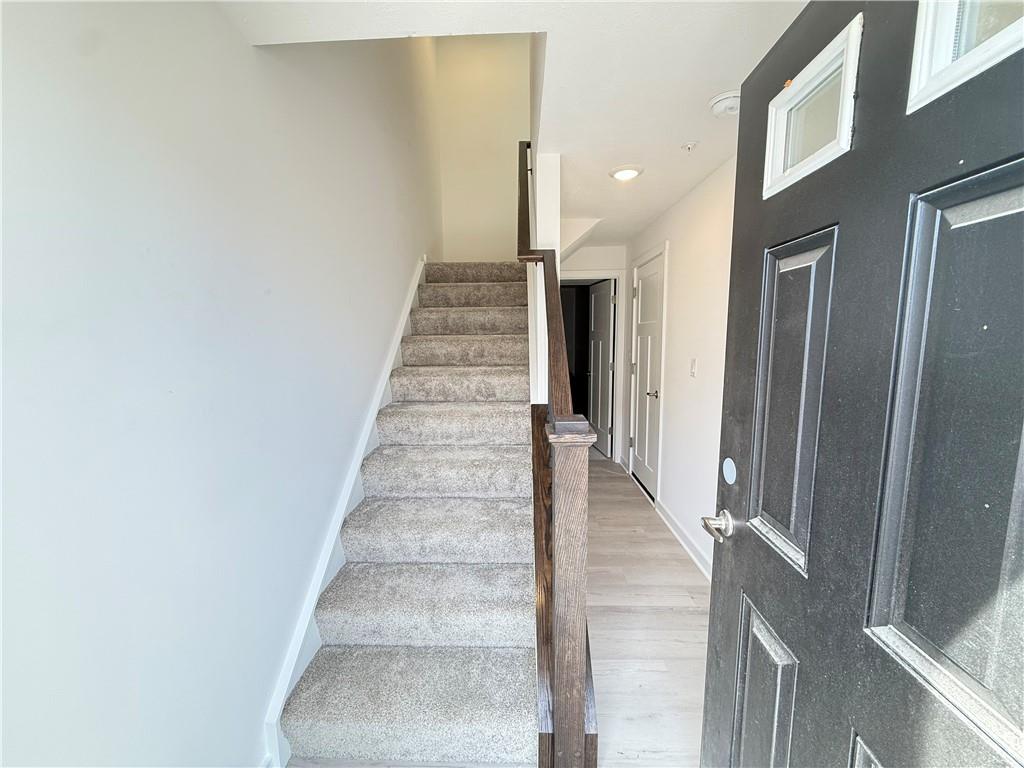 177 Lockheed Drive Coraopolis, PA 15108 - Photo 3 of 18 a view of staircase with white walls