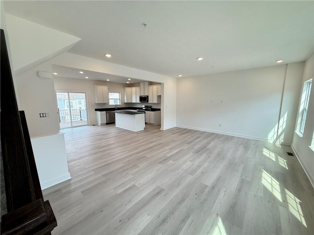 177 Lockheed Drive Coraopolis, PA 15108 - Photo 4 of 18 a view of a kitchen with a sink and wooden floor