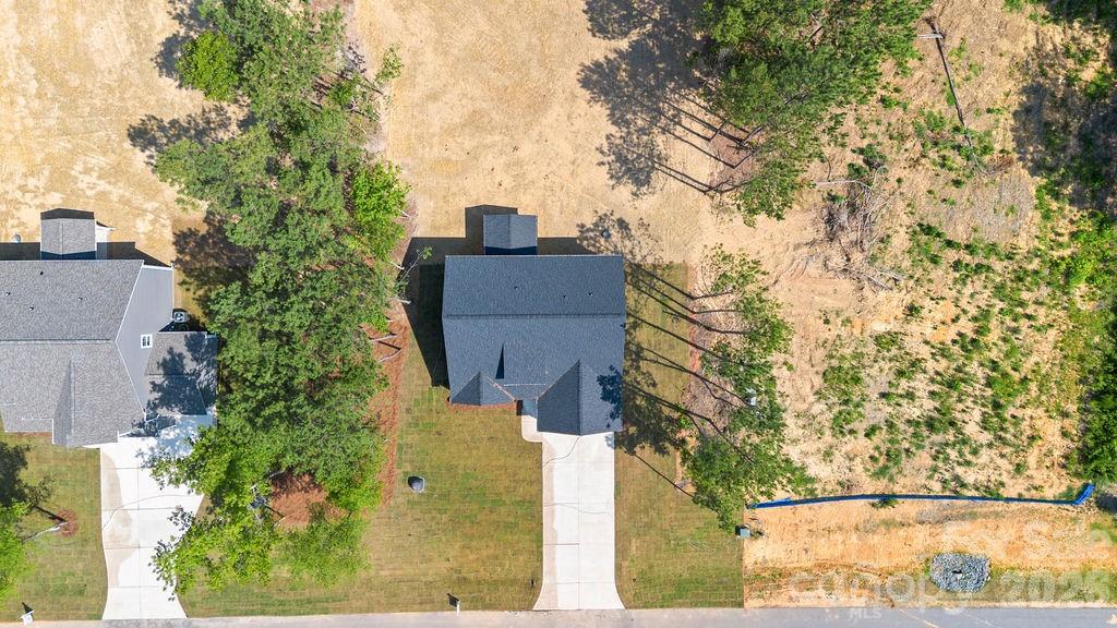 1020 Baylor Grove Road, Unit 20 Monroe, NC 28112 - Photo 4 of 45 front view of a house with a yard