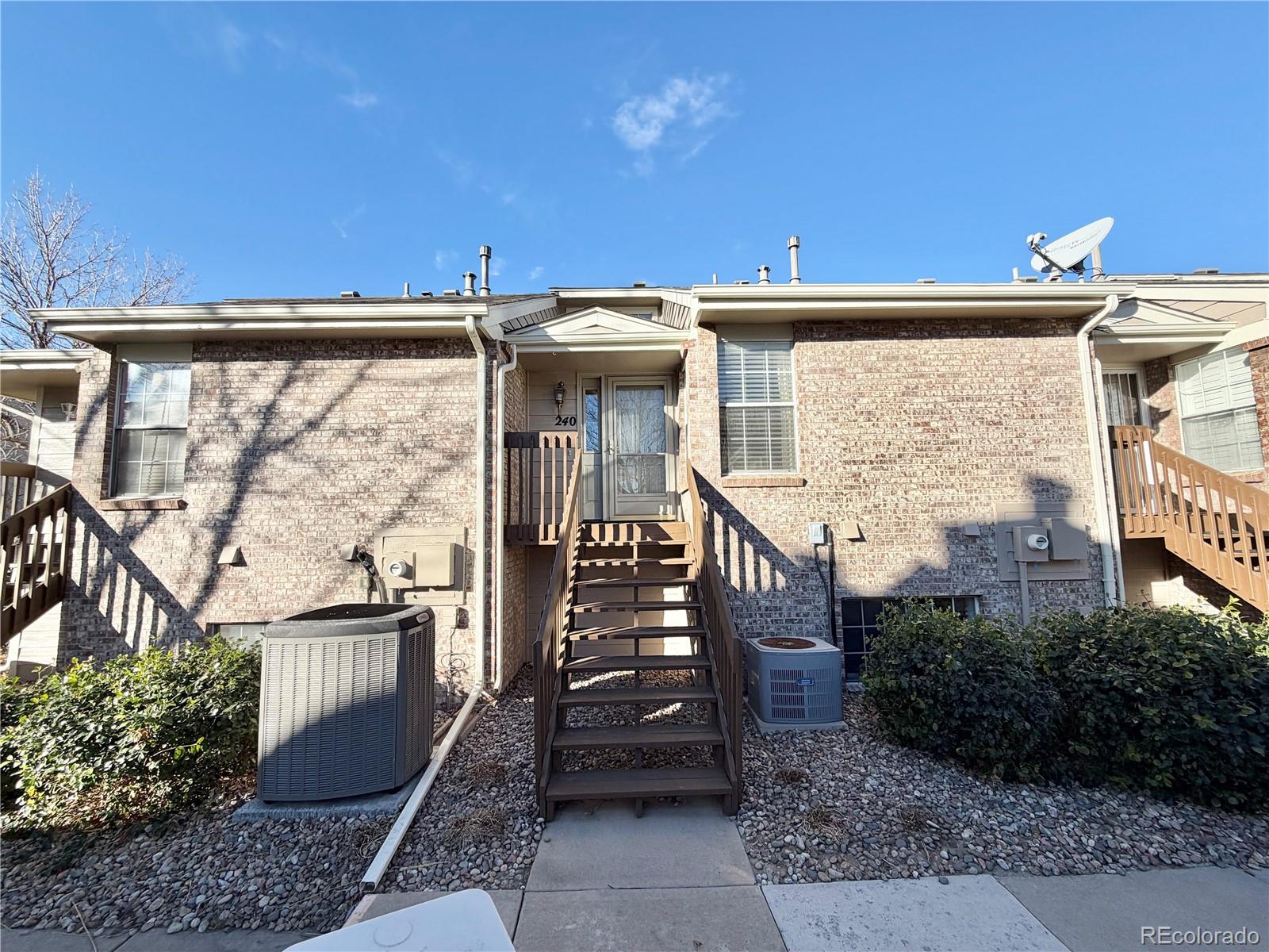 a view of a balcony with furniture