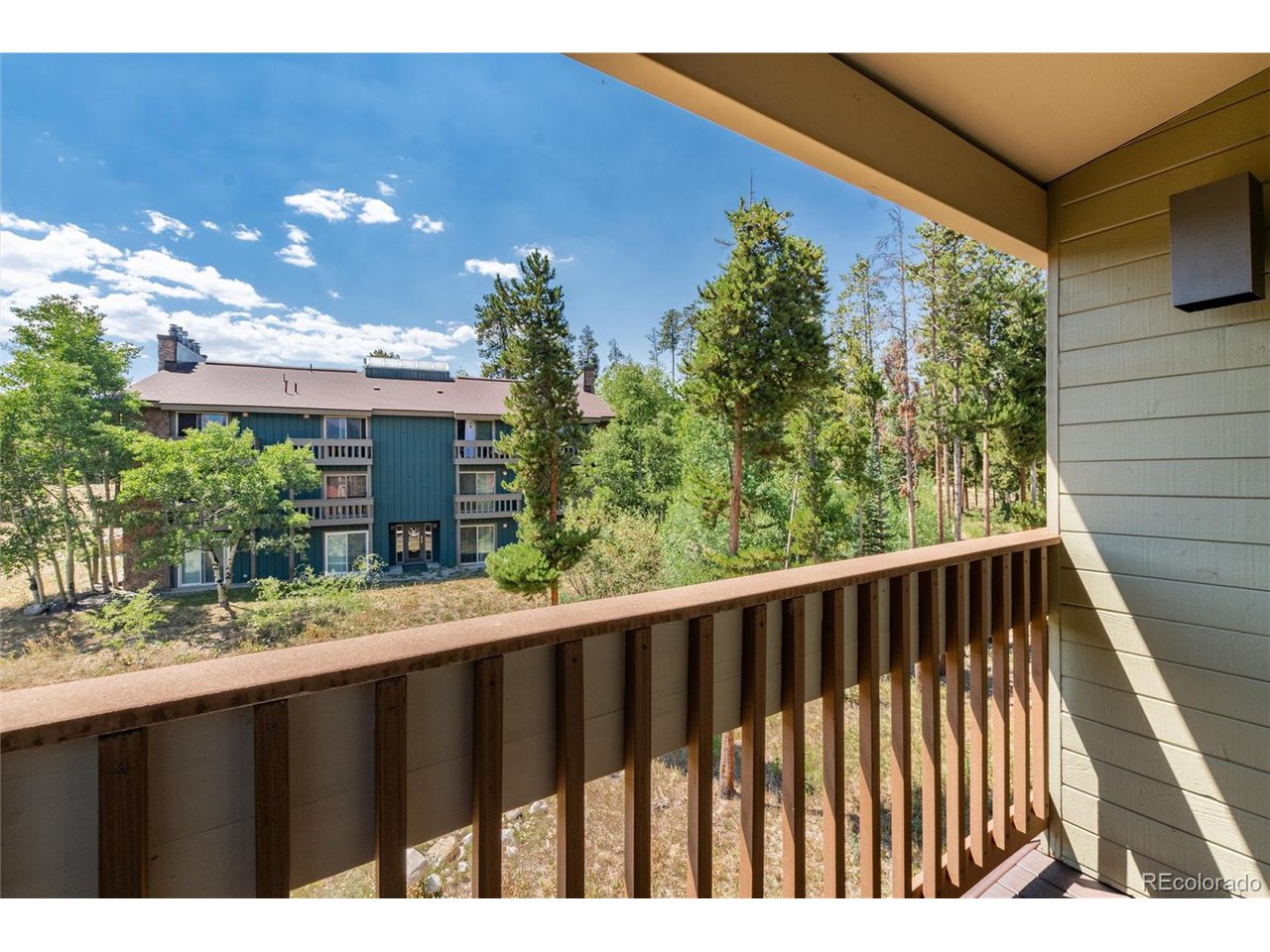 490 Kings Crossing Road, Unit 631 Winter Park, CO 80482 - Photo 37 of 43 a front view of a house with a garden