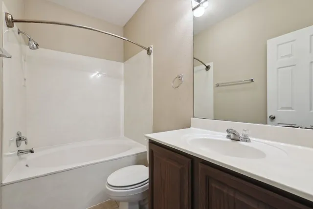 a view of a room with shelf on the wall