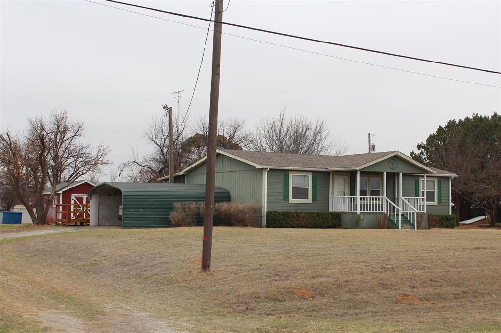 601 Carothers Avenue Rochester, TX 79544 - Photo 1 of 37 a view of a house next to a yard