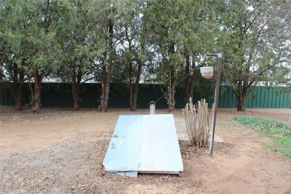 a view of backyard with green space