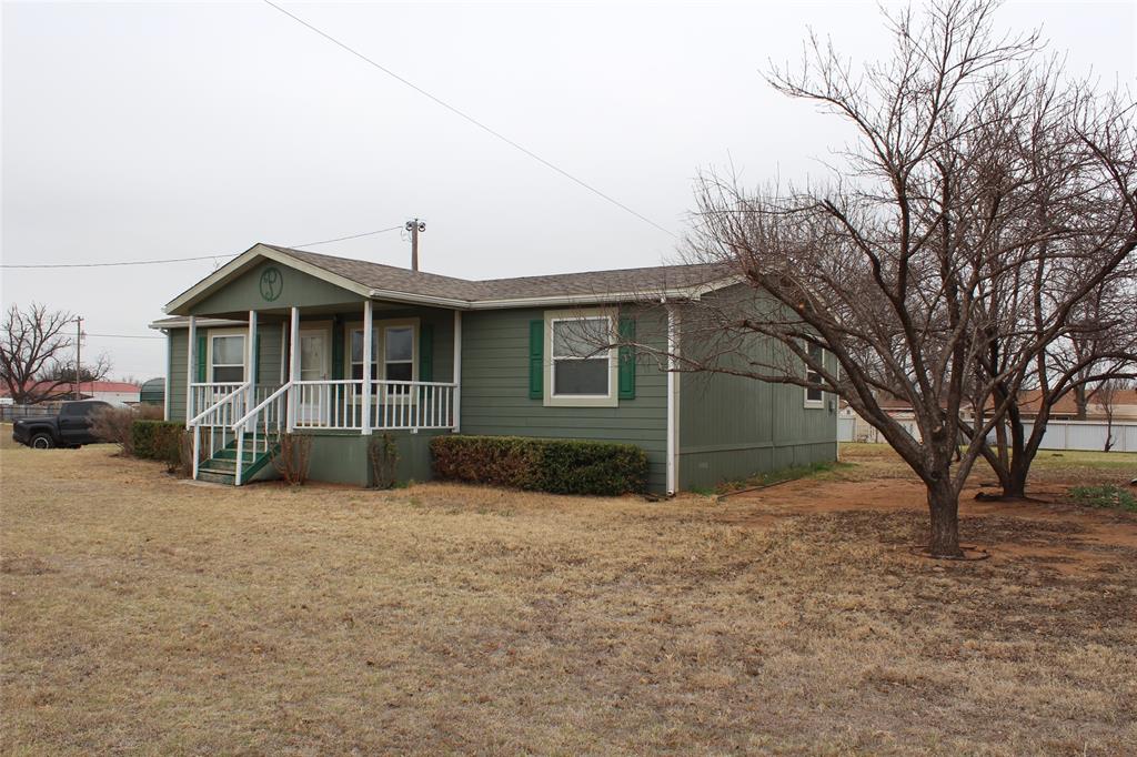 601 Carothers Avenue Rochester, TX 79544 - Photo 37 of 37 a front view of a house with a yard