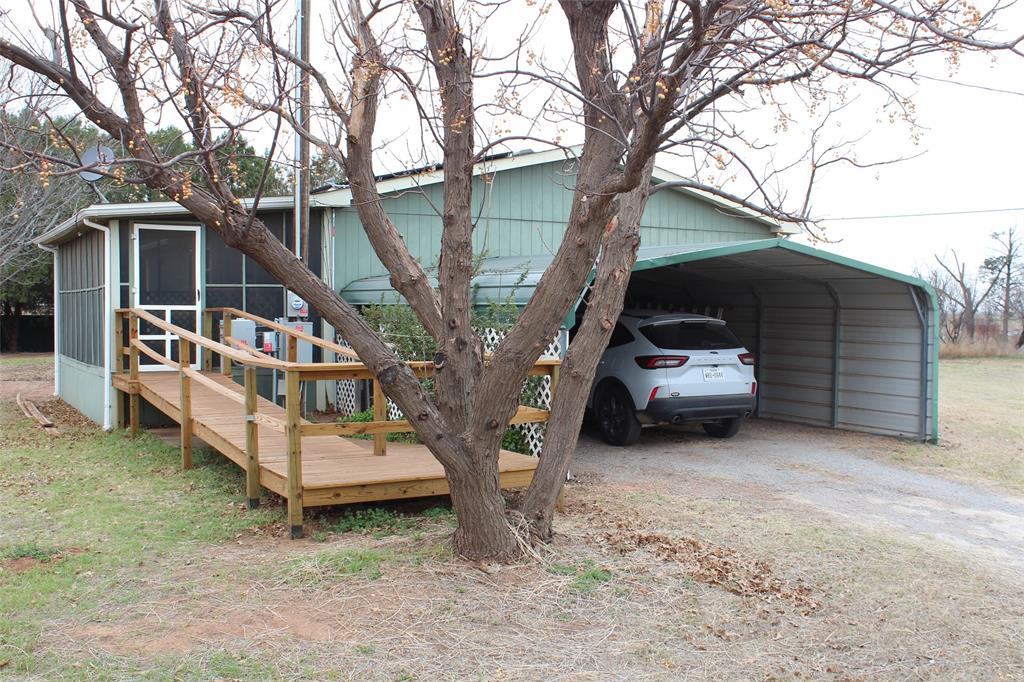601 Carothers Avenue Rochester, TX 79544 - Photo 6 of 37 a view of a house with a yard