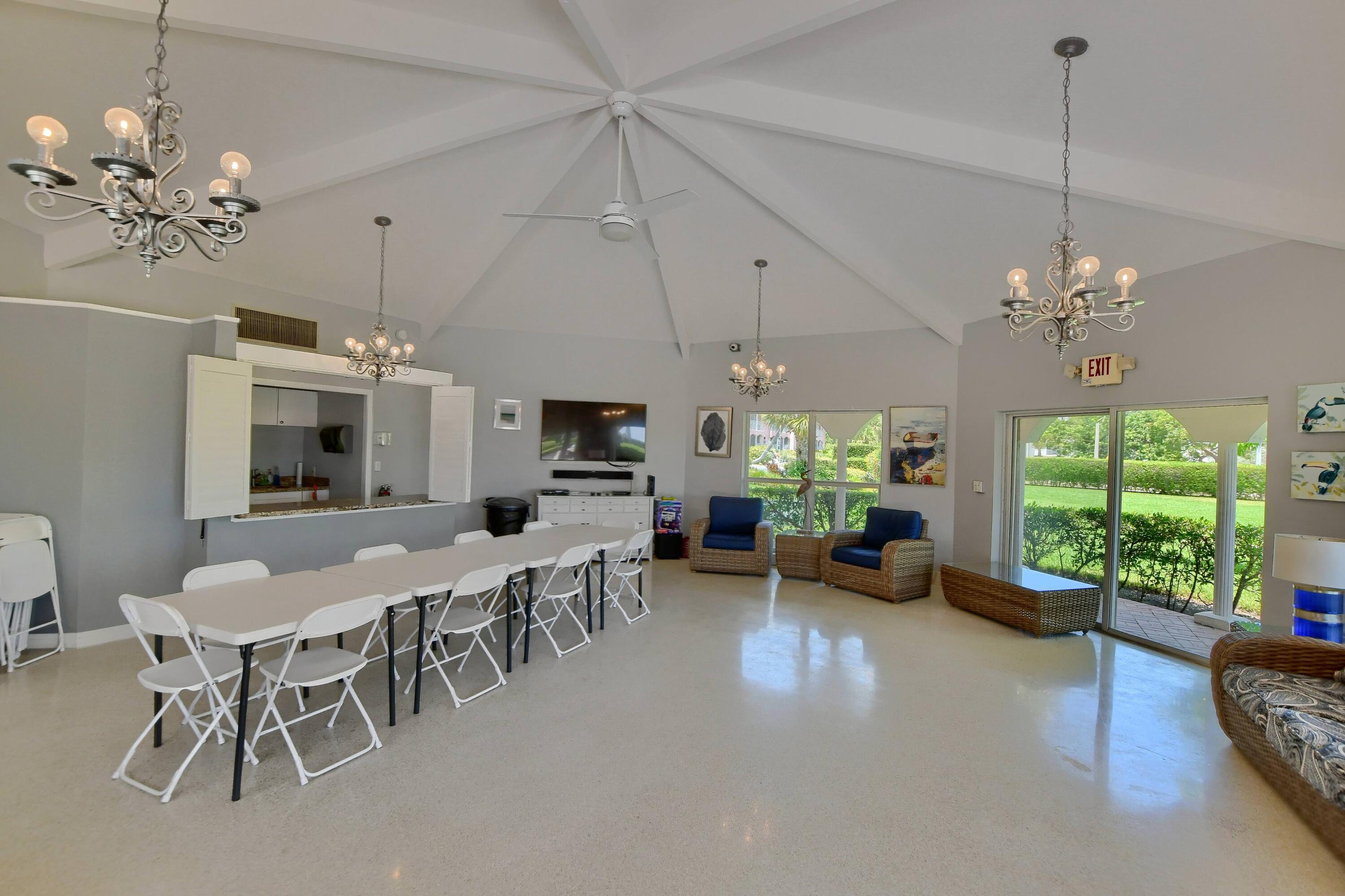 1040 Banyan Road, Unit 301C Boca Raton, FL 33432 - Photo 13 of 49 a view of a dining room with furniture window and outside view