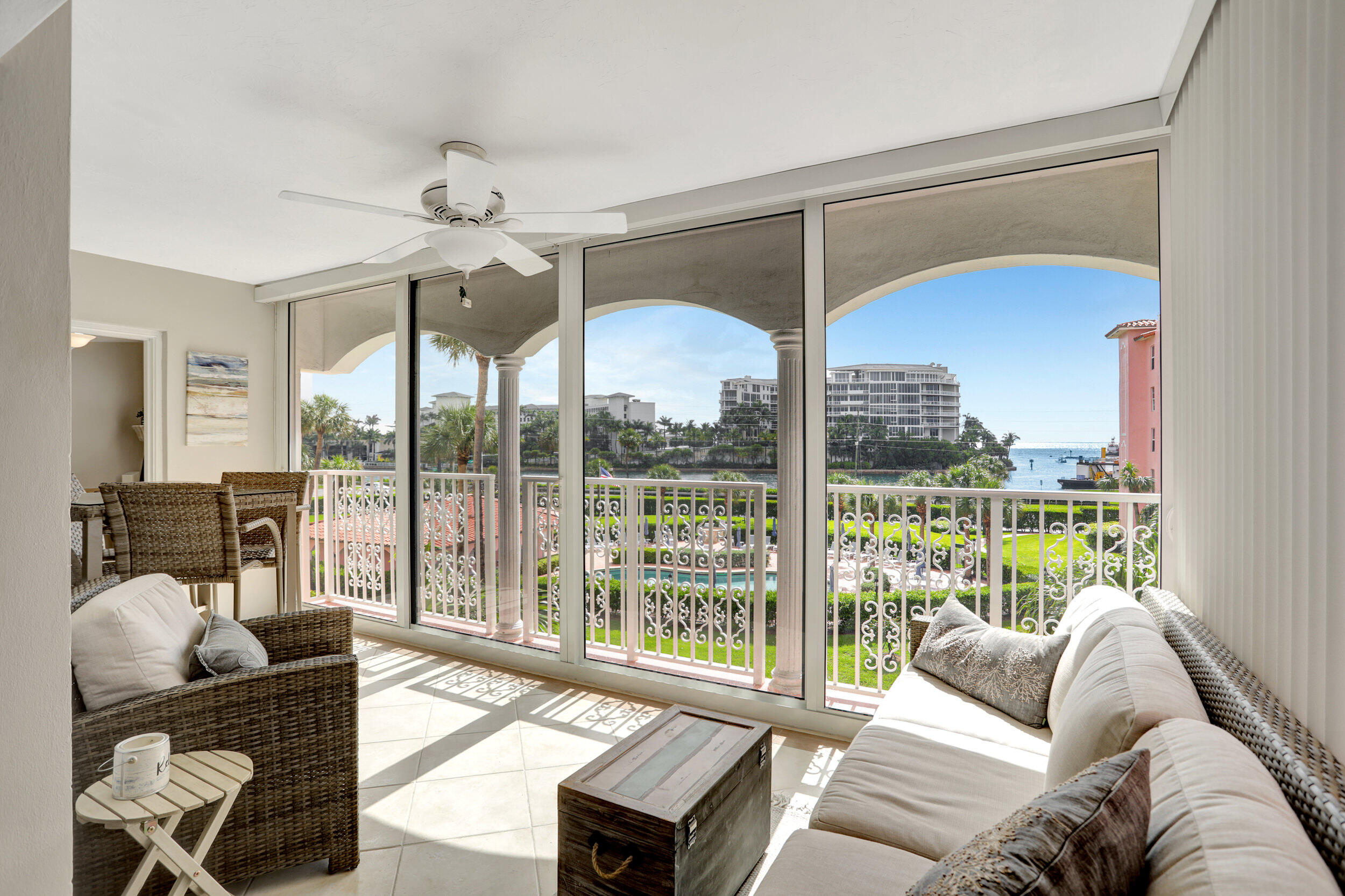 1040 Banyan Road, Unit 301C Boca Raton, FL 33432 - Photo 24 of 49 a living room with furniture and a large window