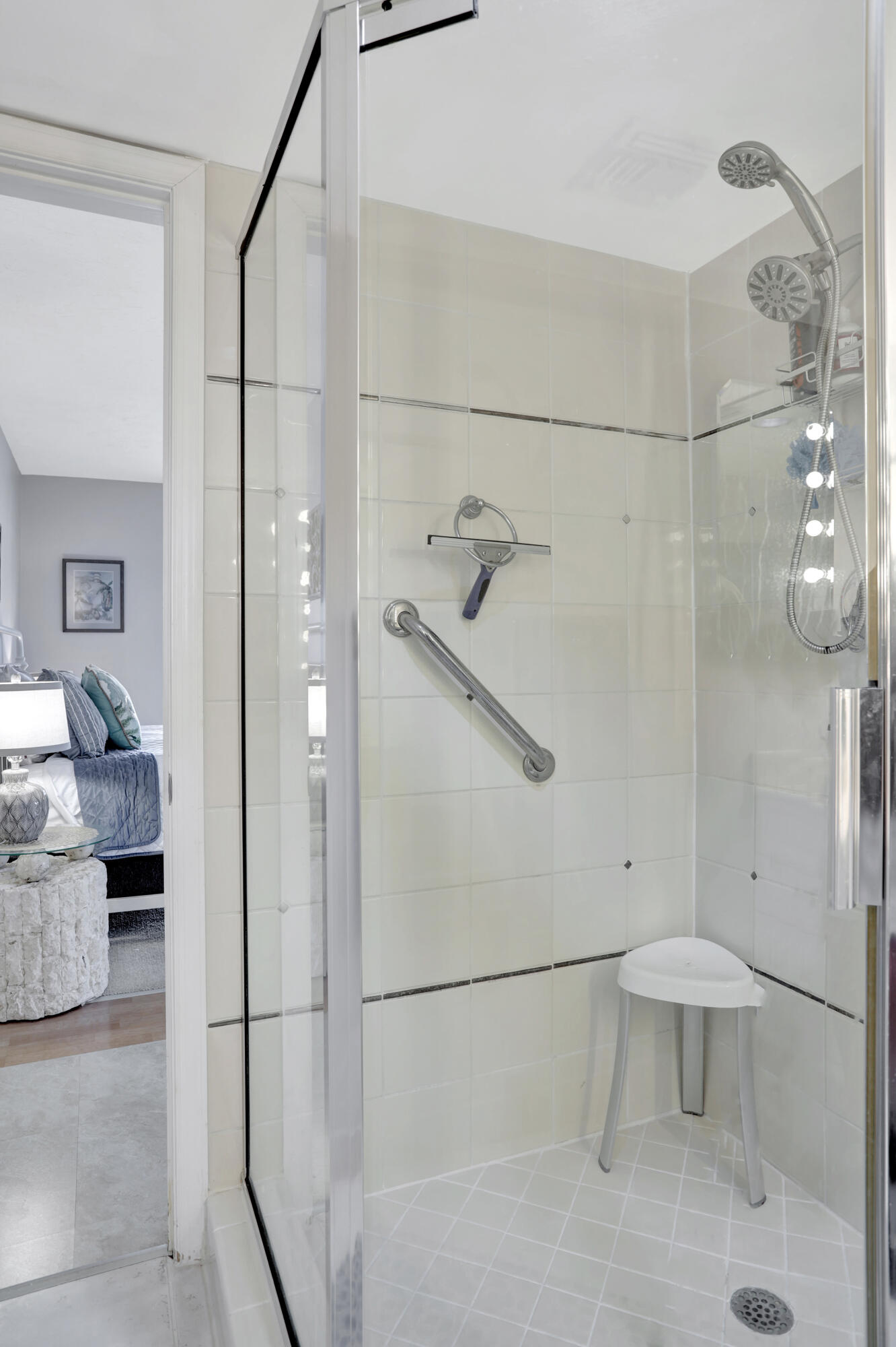 1040 Banyan Road, Unit 301C Boca Raton, FL 33432 - Photo 31 of 49 a bathroom with a shower and a sink