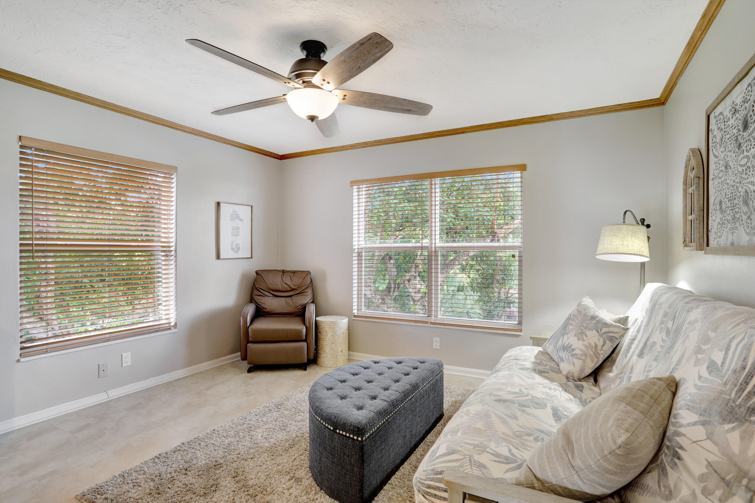 1040 Banyan Road, Unit 301C Boca Raton, FL 33432 - Photo 36 of 49 a living room with furniture and a large window