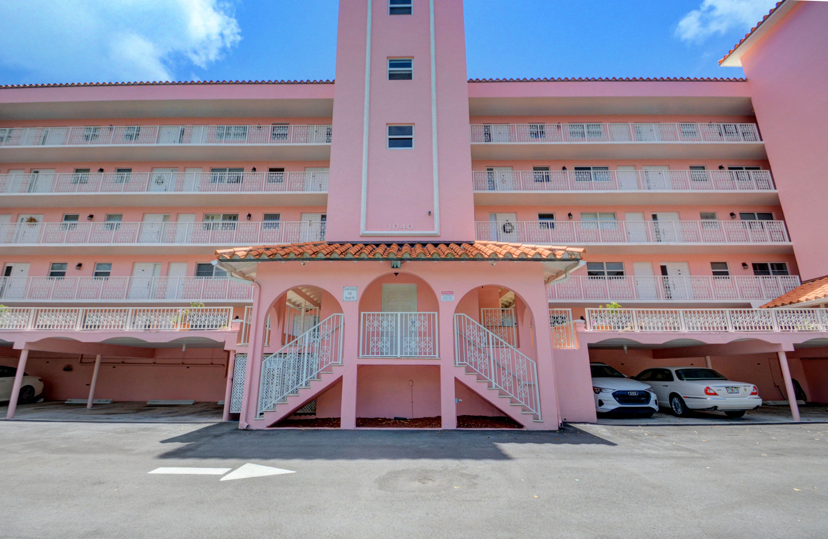1040 Banyan Road, Unit 301C Boca Raton, FL 33432 - Photo 40 of 49 a view of a car park in front of building