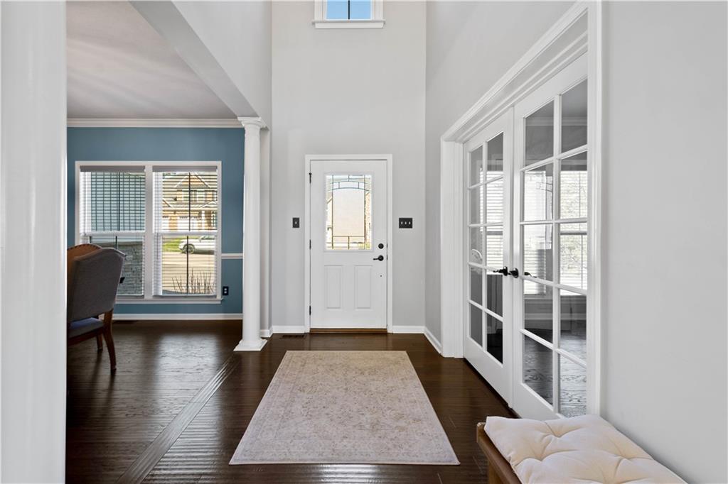 4528 Walnut Ridge Circle McDonald, PA 15057 - Photo 2 of 50 a view of a hallway with wooden floor and windows