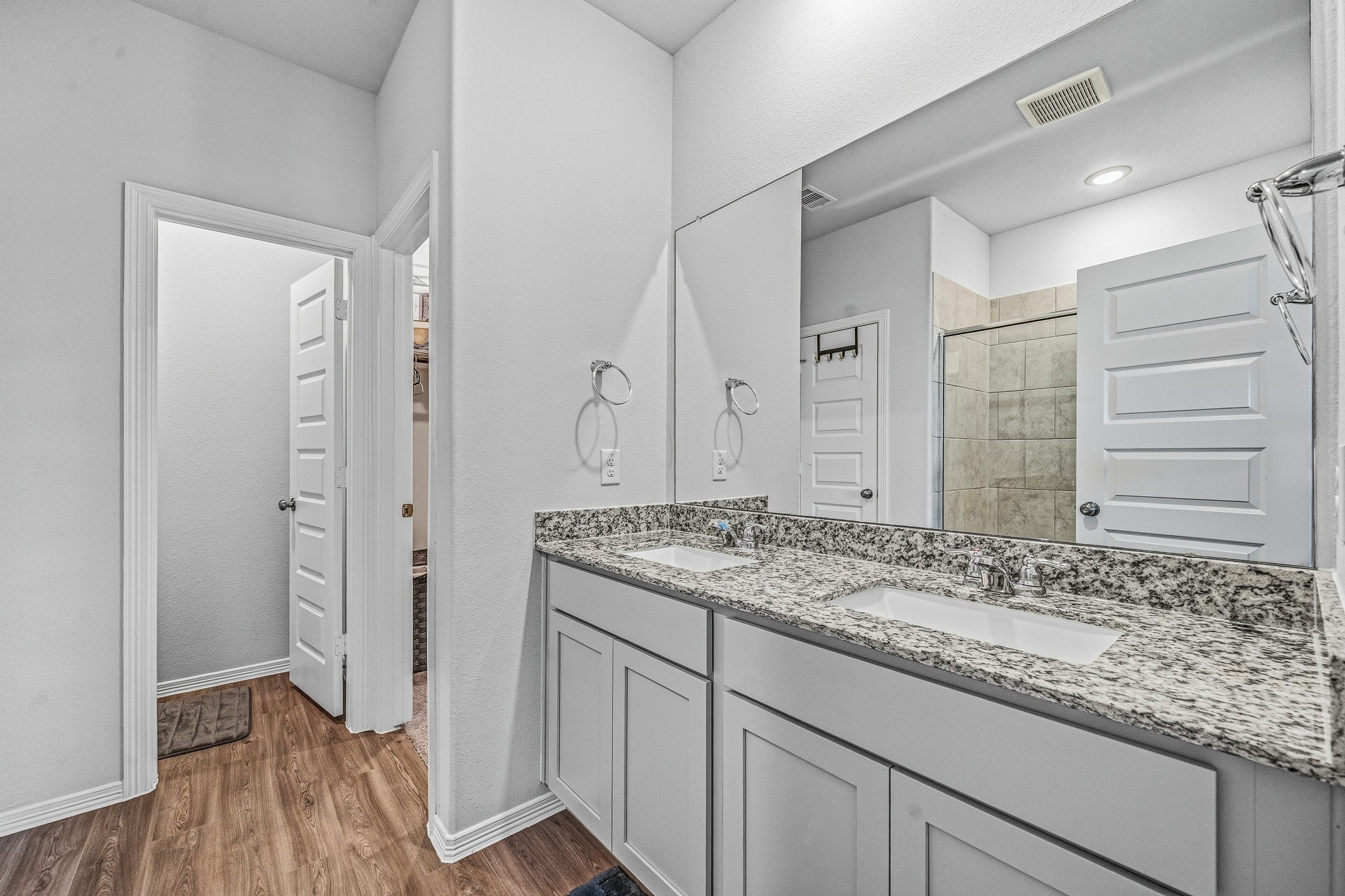 5903 Dawning Sun Road Katy, TX 77493 - Photo 17 of 37 a bathroom with a granite countertop sink and a mirror