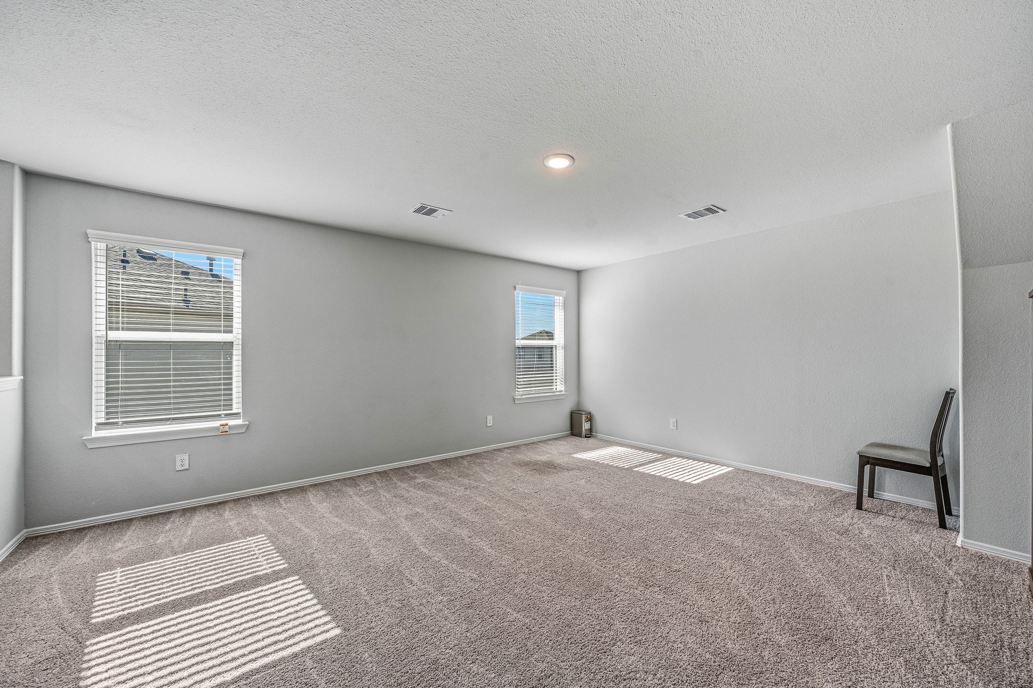 5903 Dawning Sun Road Katy, TX 77493 - Photo 24 of 37 a view of an empty room with a window