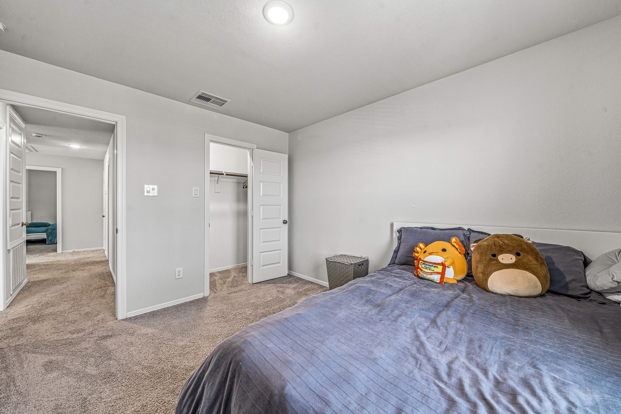 5903 Dawning Sun Road Katy, TX 77493 - Photo 31 of 37 a bedroom with a bed and painting on the wall