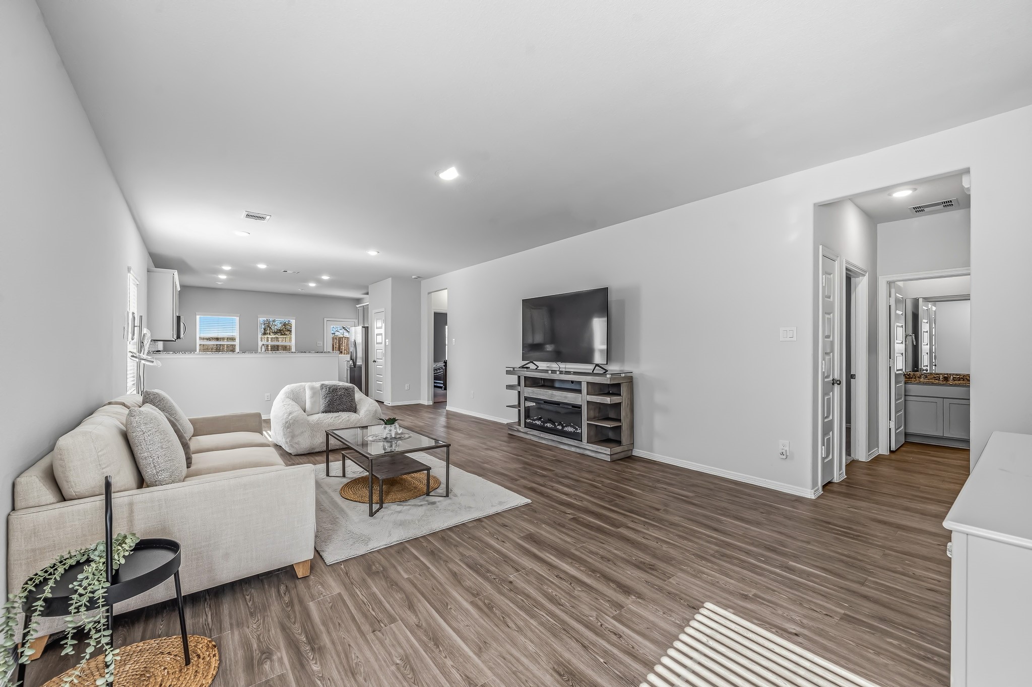 5903 Dawning Sun Road Katy, TX 77493 - Photo 9 of 37 a living room with furniture and a wooden floor