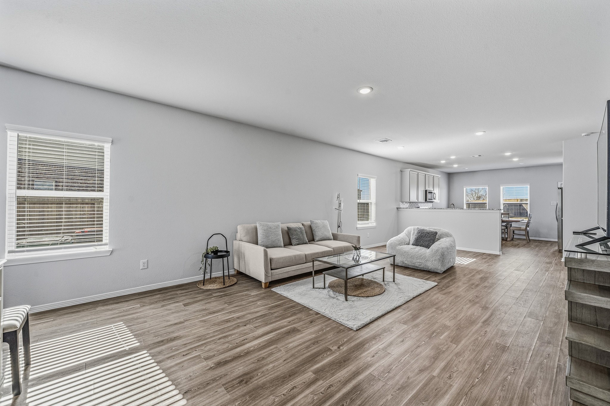 5903 Dawning Sun Road Katy, TX 77493 - Photo 10 of 37 a living room with furniture window and wooden floor