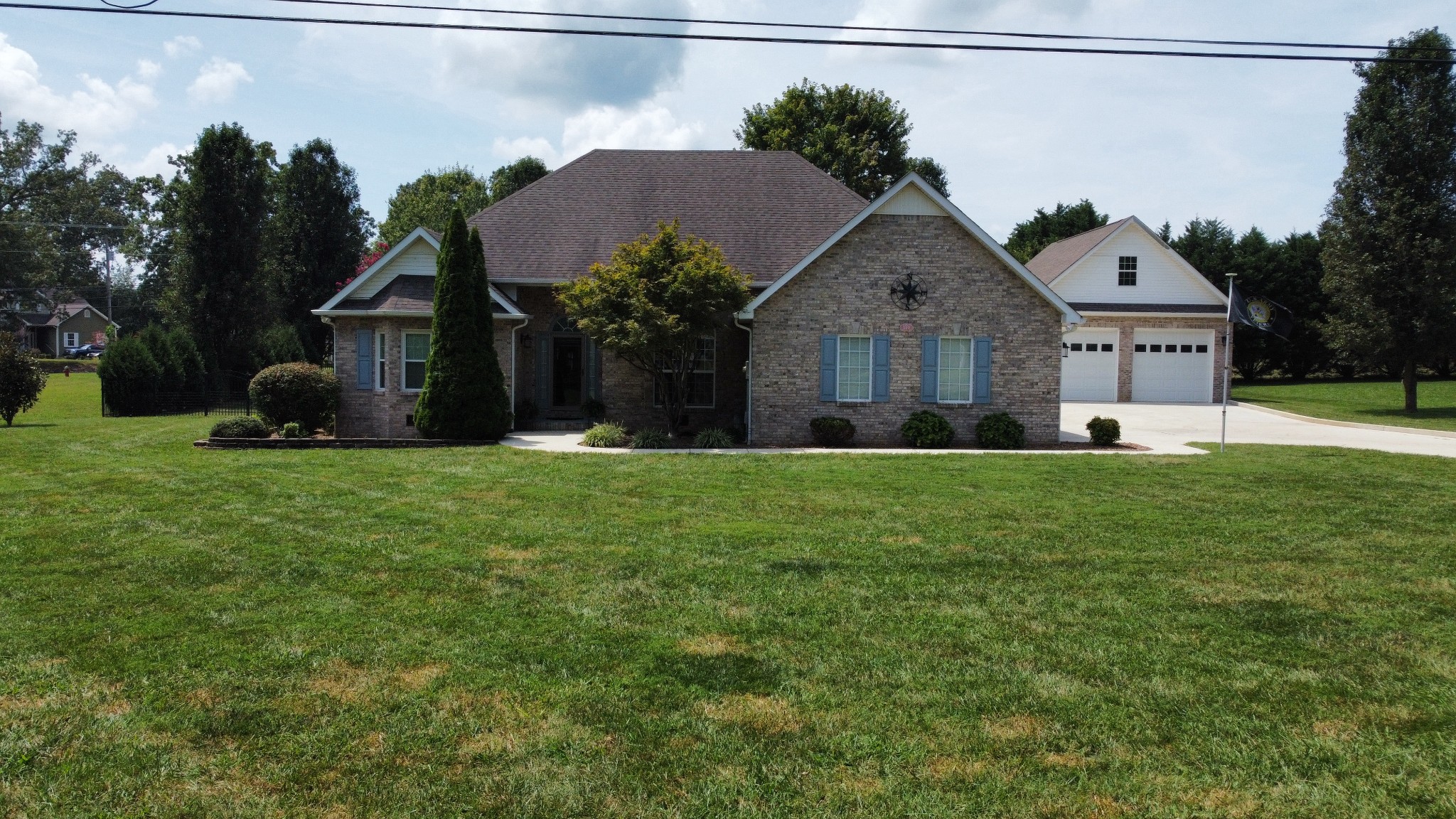 119 Riva Lake Road Winchester, TN 37398 - Photo 3 of 27 Large lot fenced back yard with lots of concrete for parking.