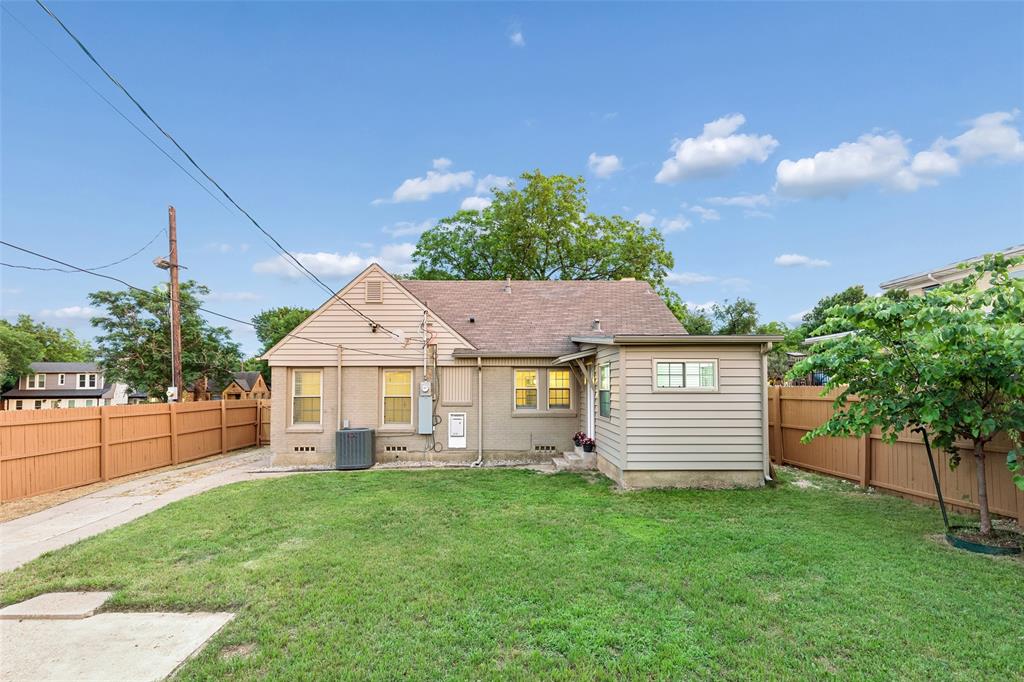 2427 Alco Avenue Dallas, TX 75211 - Photo 23 of 26 a view of a house with a backyard