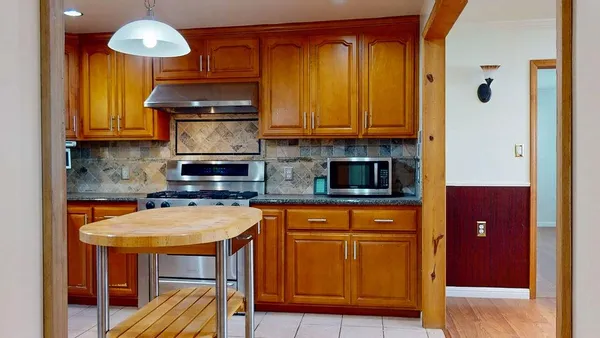 a bathroom with a shower and a tub