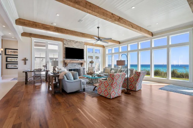 a view of a dining room with furniture wooden floor and chandelier