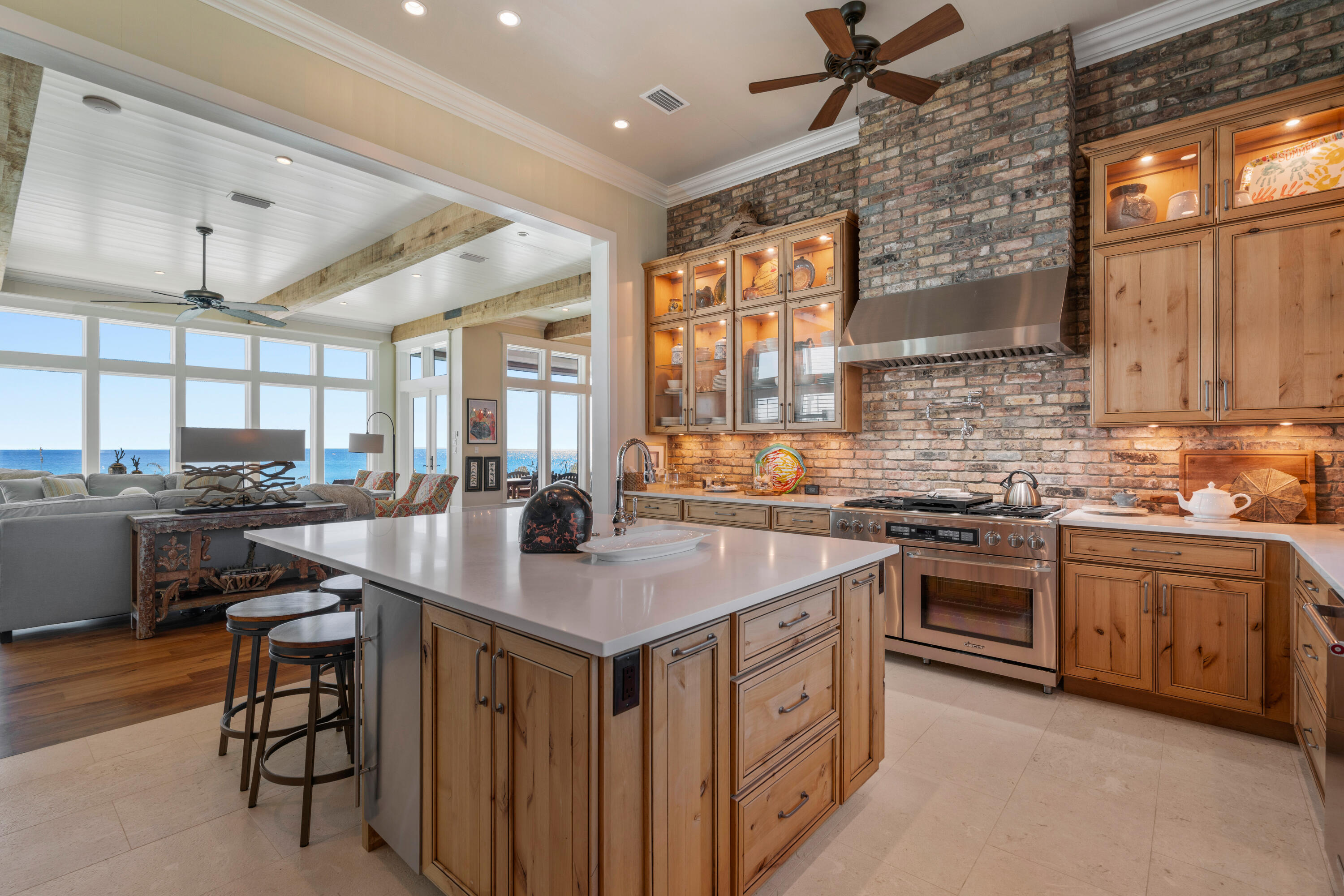 556 Blue Mountain Road Santa Rosa Beach, FL 32459 - Photo 27 of 72 a kitchen with a sink stove and cabinets