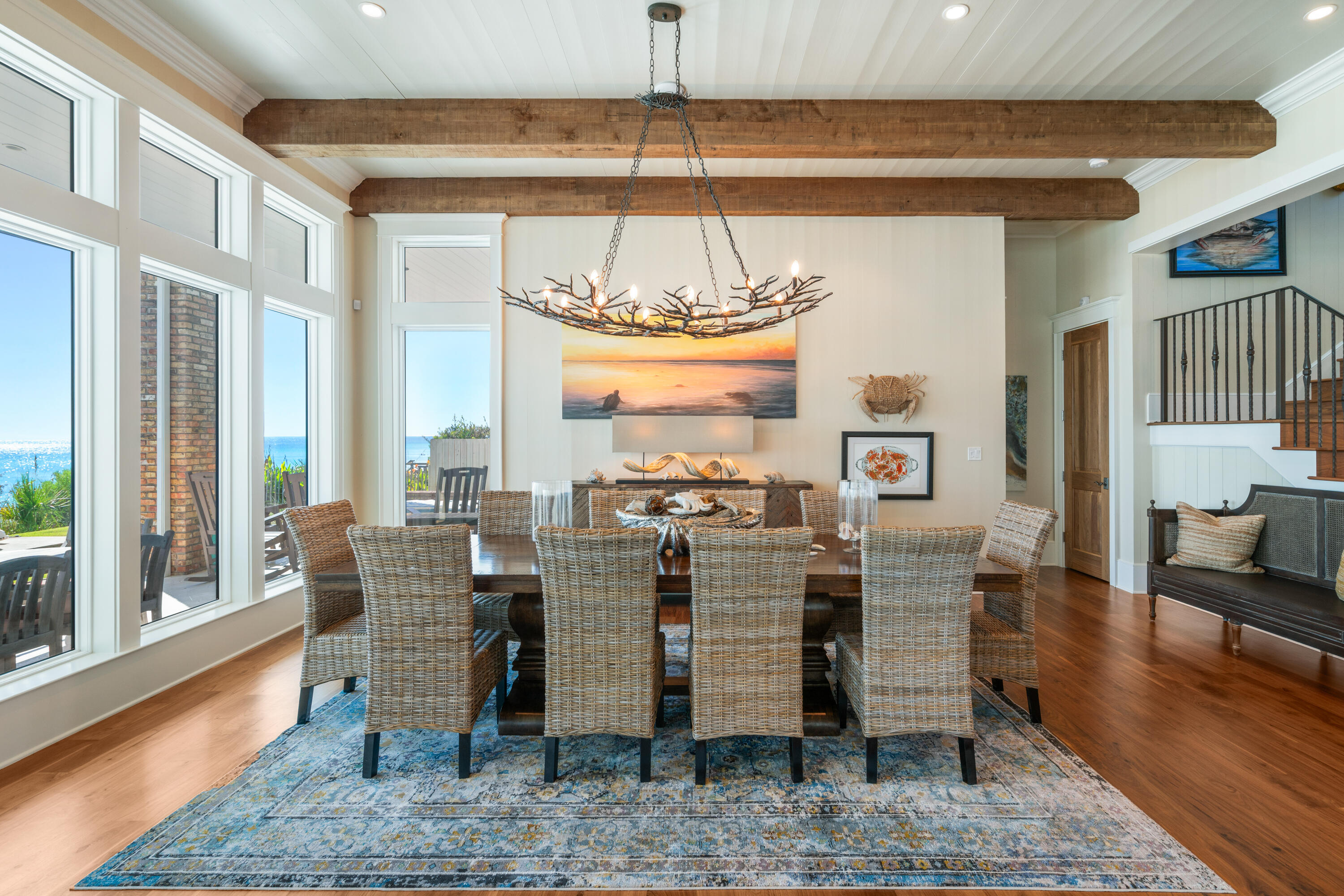 556 Blue Mountain Road Santa Rosa Beach, FL 32459 - Photo 28 of 72 a view of a dining room with furniture window and wooden floor