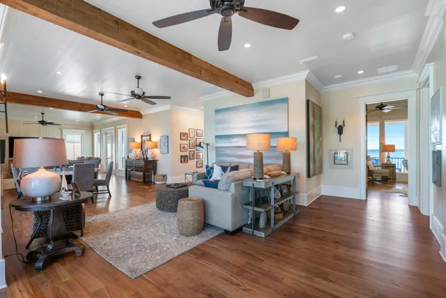 a spacious bedroom with a large bed and a large window