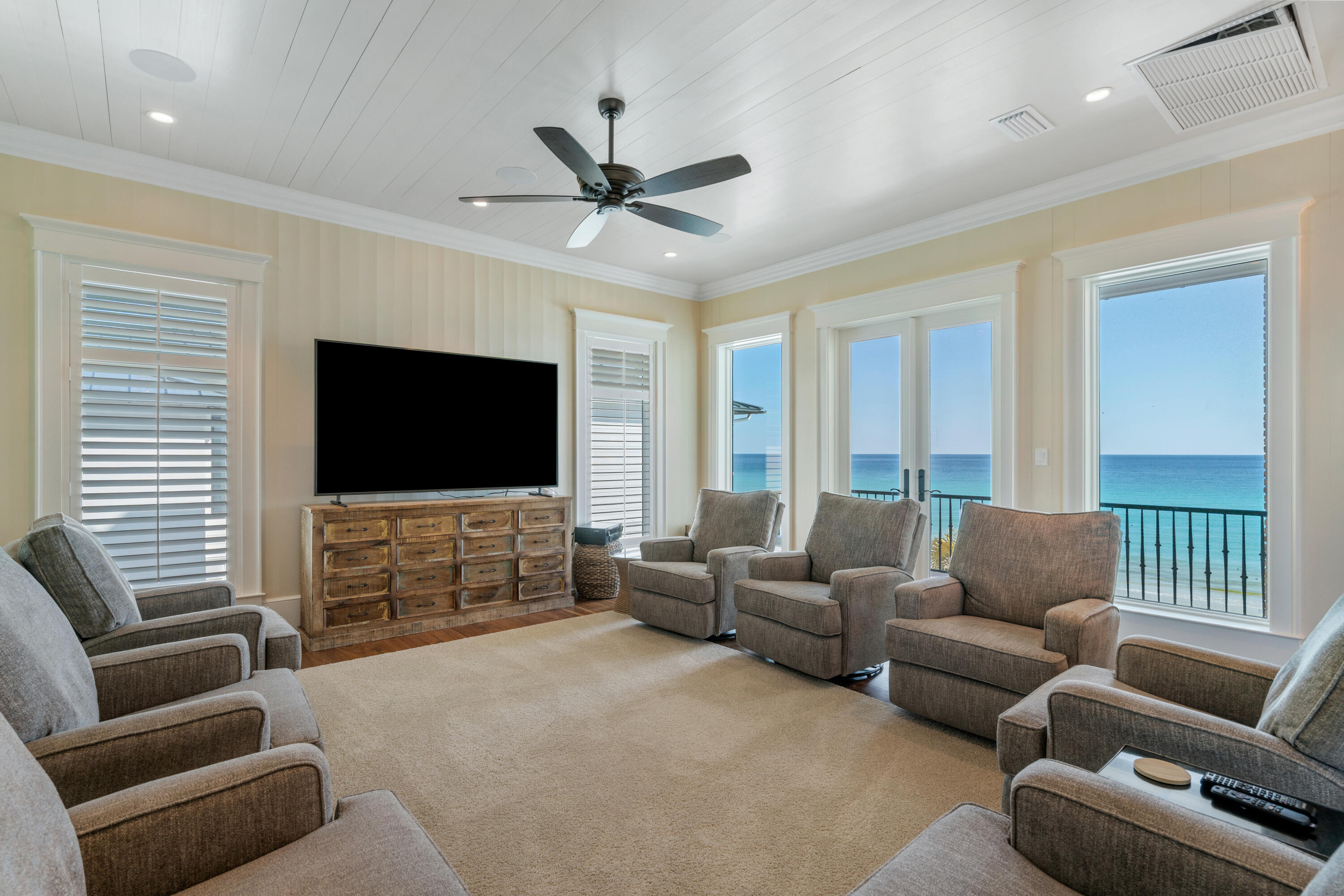 556 Blue Mountain Road Santa Rosa Beach, FL 32459 - Photo 37 of 72 a living room with furniture and a flat screen tv