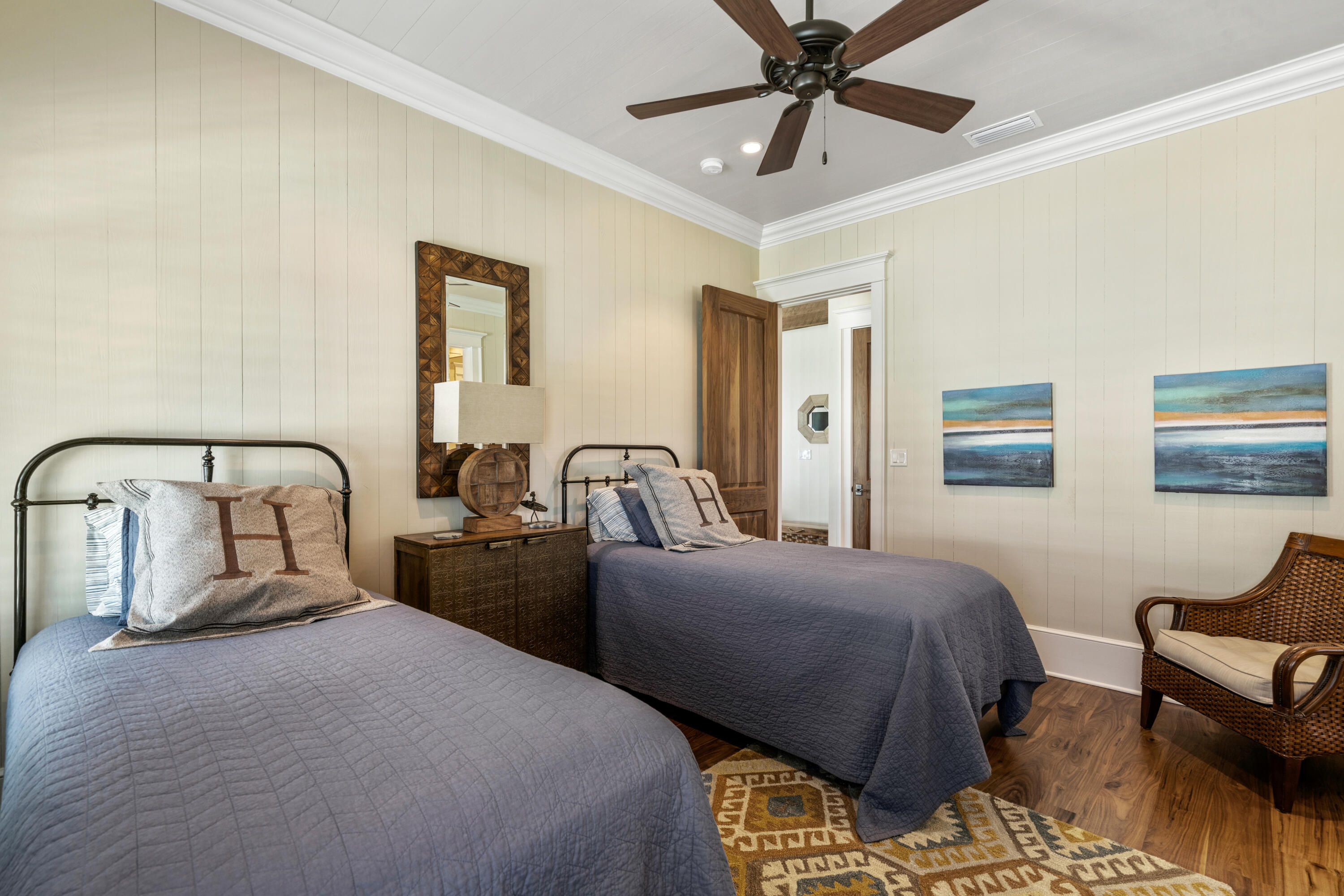 556 Blue Mountain Road Santa Rosa Beach, FL 32459 - Photo 39 of 72 a bedroom with two beds and painting on the wall