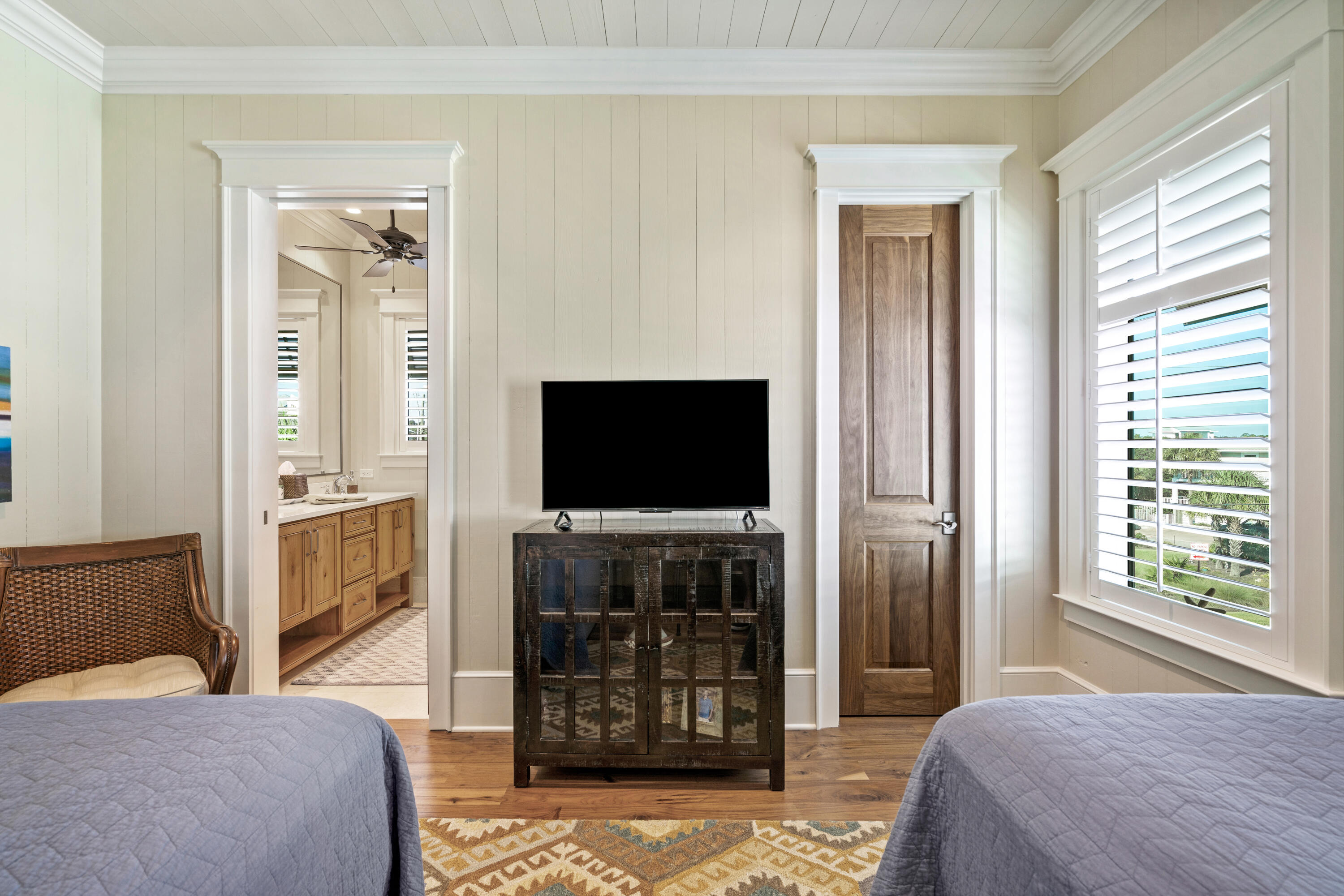 556 Blue Mountain Road Santa Rosa Beach, FL 32459 - Photo 40 of 72 a bedroom with a bed and a television