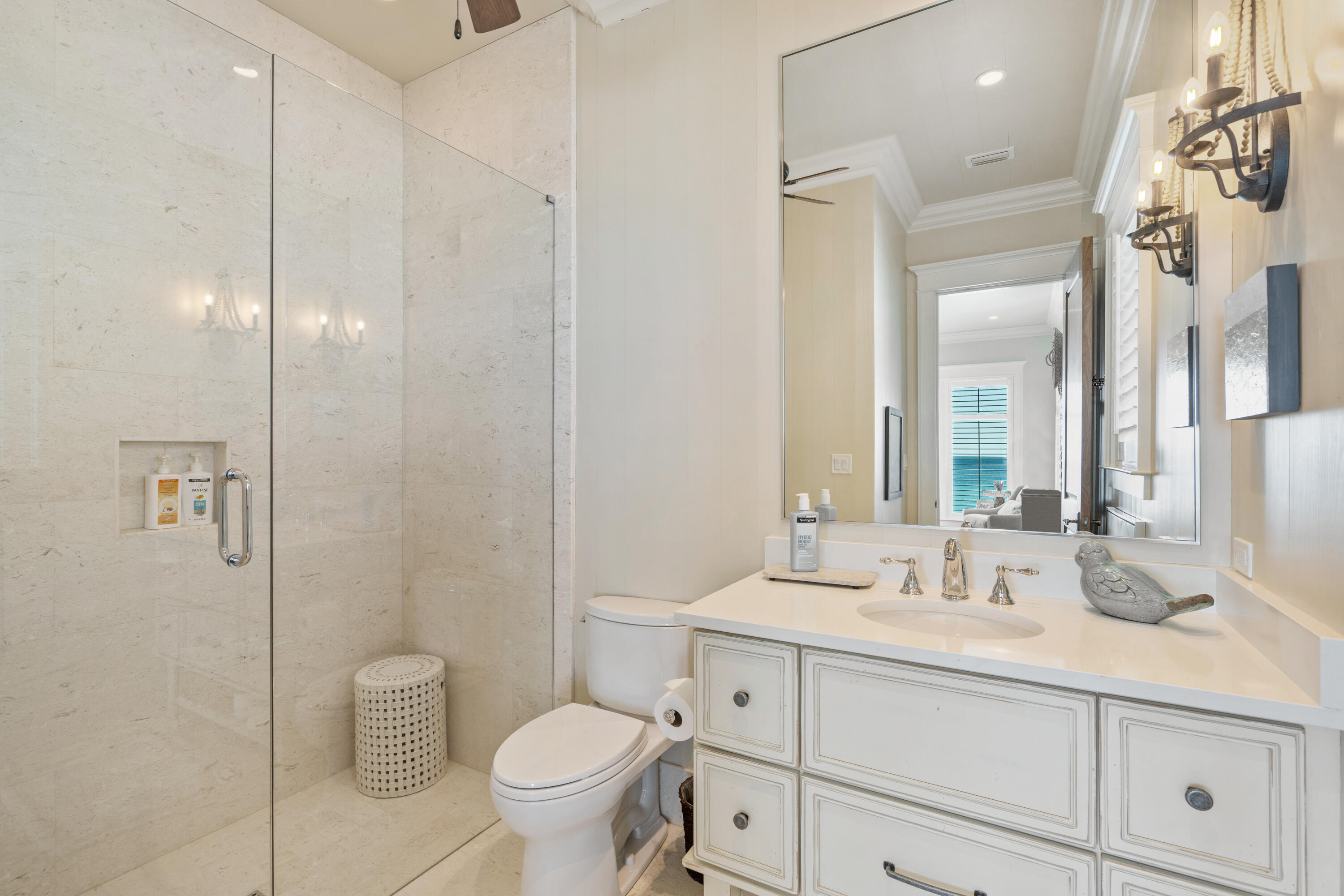 556 Blue Mountain Road Santa Rosa Beach, FL 32459 - Photo 44 of 72 a bathroom with a sink toilet and shower