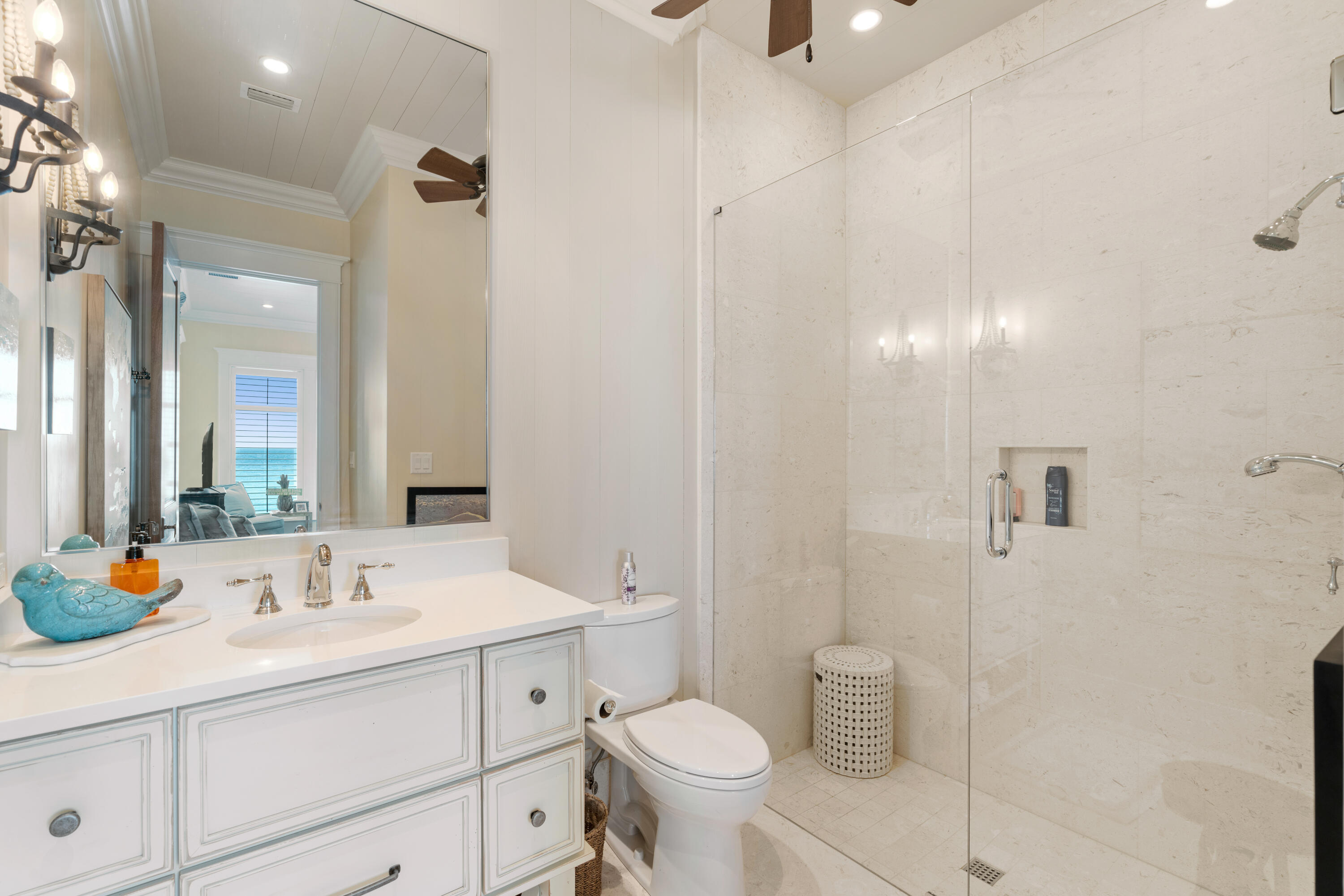 556 Blue Mountain Road Santa Rosa Beach, FL 32459 - Photo 47 of 72 a bathroom with a sink toilet and shower
