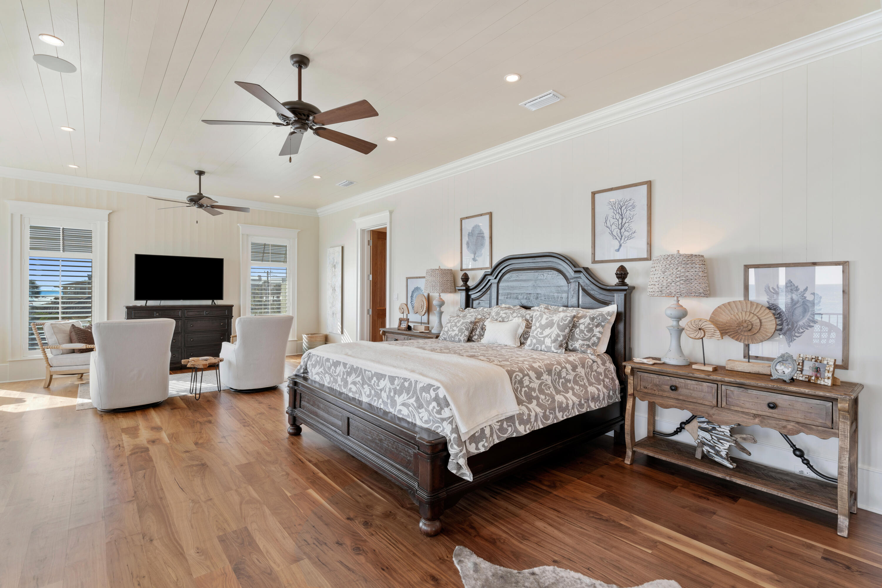 556 Blue Mountain Road Santa Rosa Beach, FL 32459 - Photo 52 of 72 a bedroom with a bed and a flat screen tv