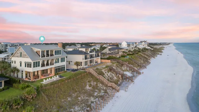 a view of a patio with a table and chairs