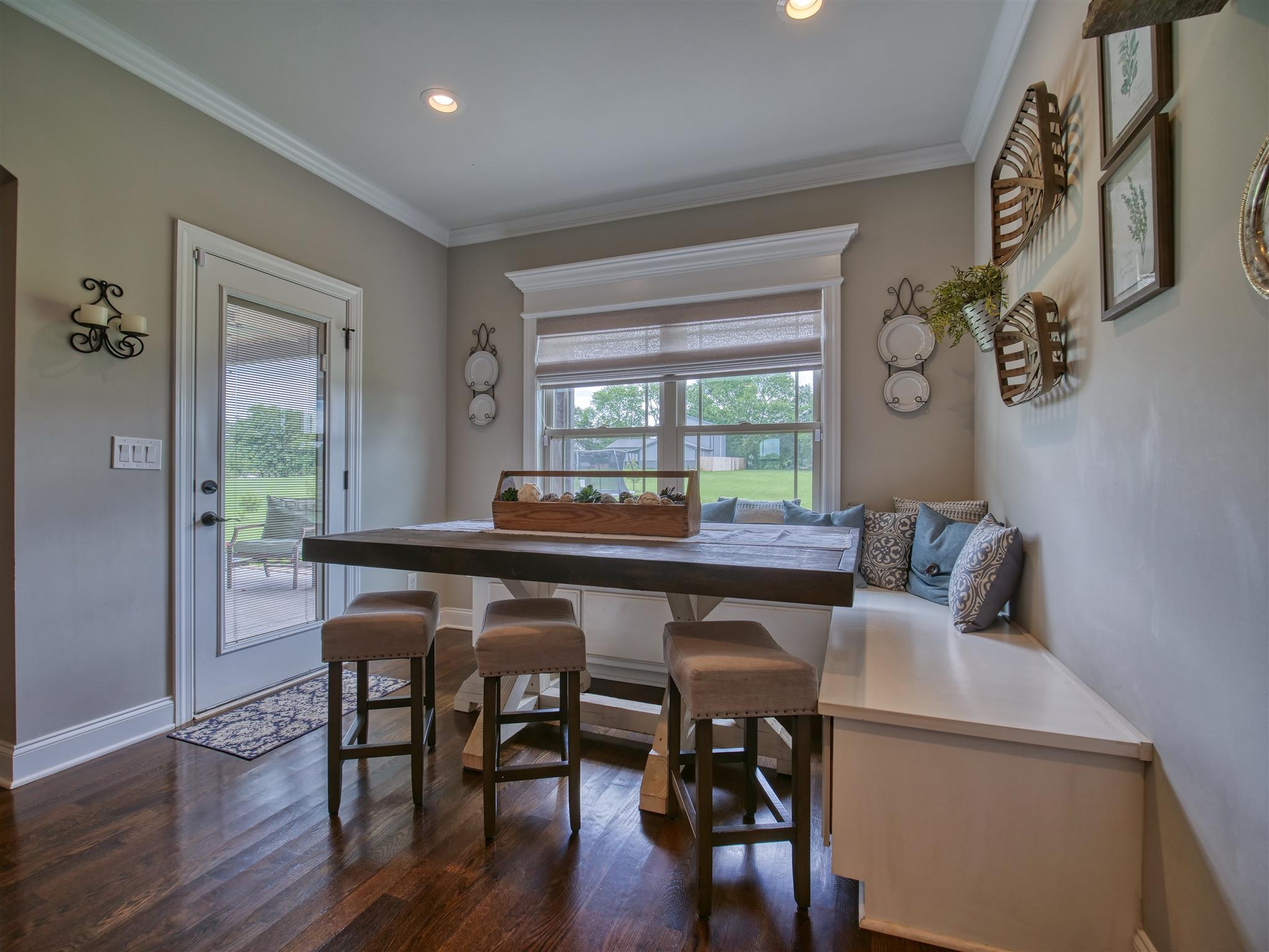 9590 Mona Road Murfreesboro, TN 37129 - Photo 12 of 30 a kitchen with a table and chairs in it