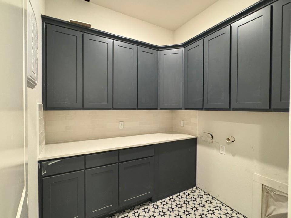 2209 Continent Court Krum, TX 76249 - Photo 15 of 24 a bathroom with a sink and a mirror