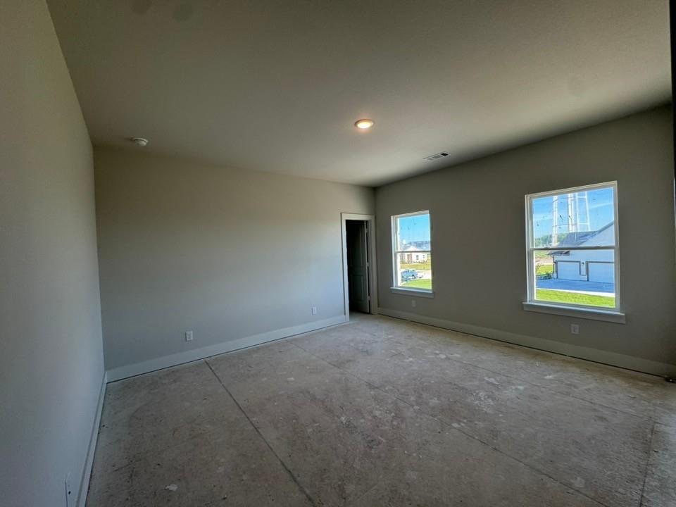 2209 Continent Court Krum, TX 76249 - Photo 20 of 24 an empty room with windows