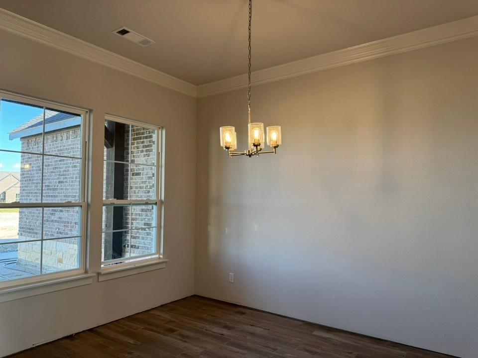 2209 Continent Court Krum, TX 76249 - Photo 6 of 24 a view of empty room with wooden floor and fan