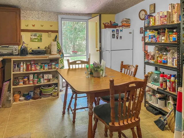 a bathroom with a shower and a sink